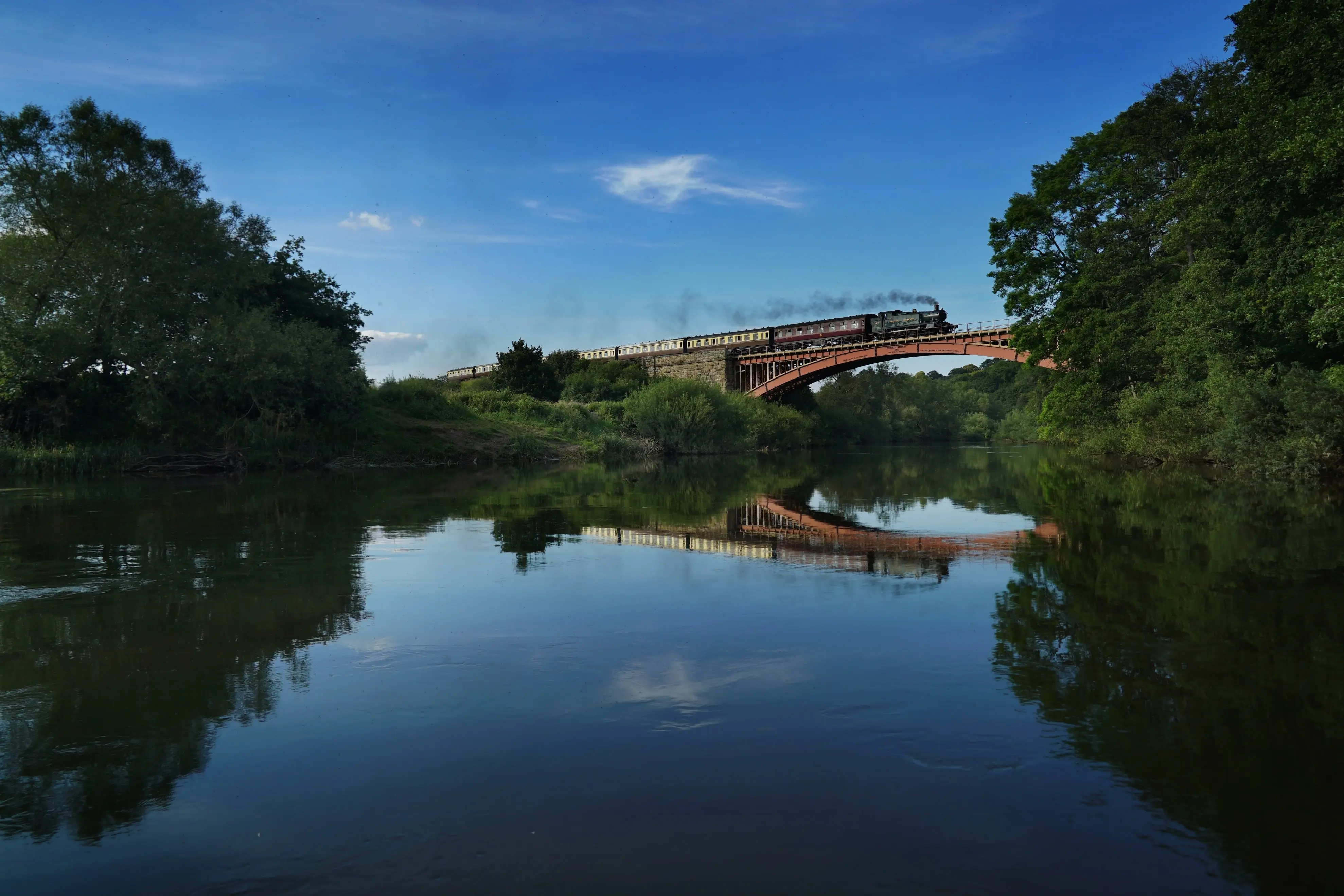 Railway Enthusiasts: A train crossing the Victoria Bridge