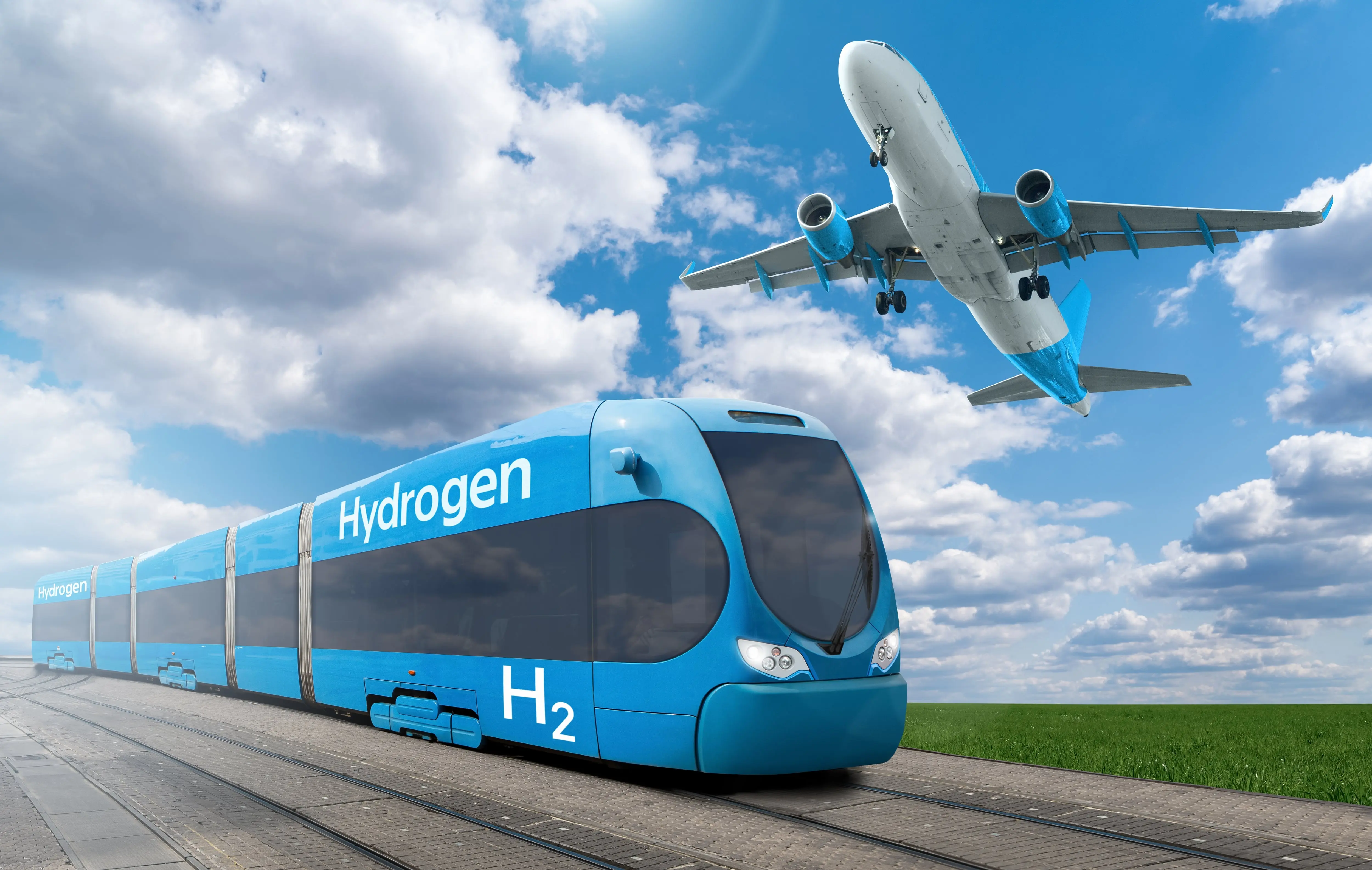 Train Fuel: A concept image of a hydrogen-fuelled blue train with a plane flying above it.